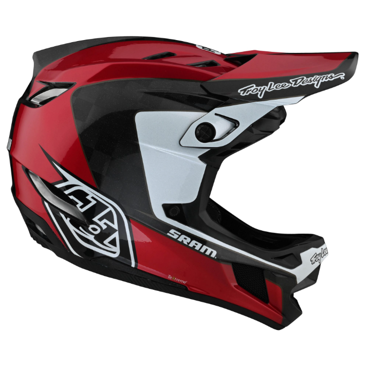 Red and black motorcycle helmet with visible branding on a white background