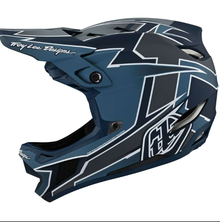 Blue motocross helmet with white designs on a white background