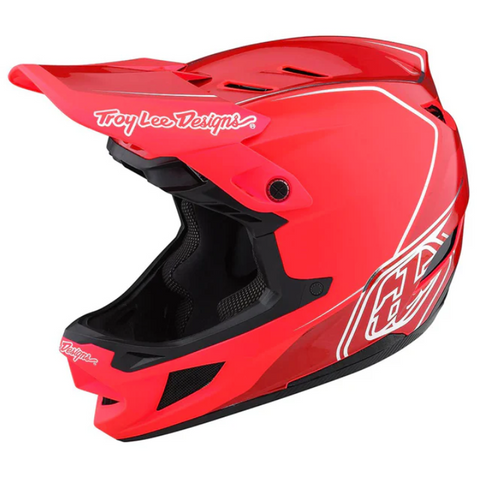Red motocross helmet with Troy Lee Designs logo on a white background