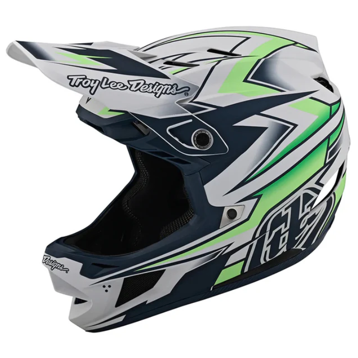 Motocross helmet with green and black design on a white background