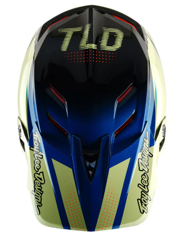 Colorful motocross helmet with 'TLD' branding on a white background