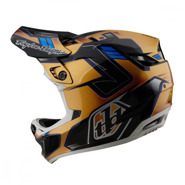 Brown and black motocross helmet with visible branding on a white background