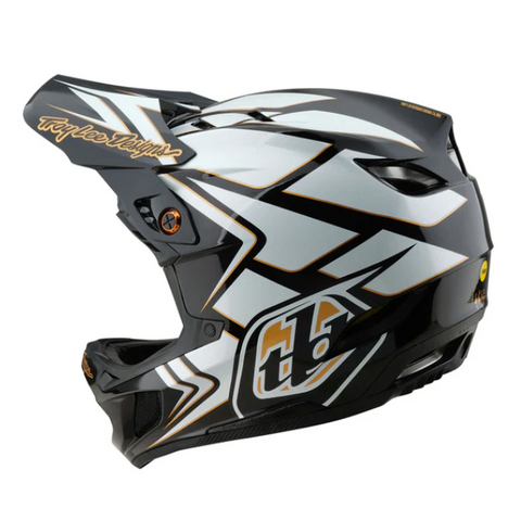 Motorcycle helmet with white, black, and gold design on a white background