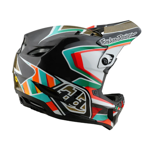 Colorful motocross helmet with geometric pattern on a white background