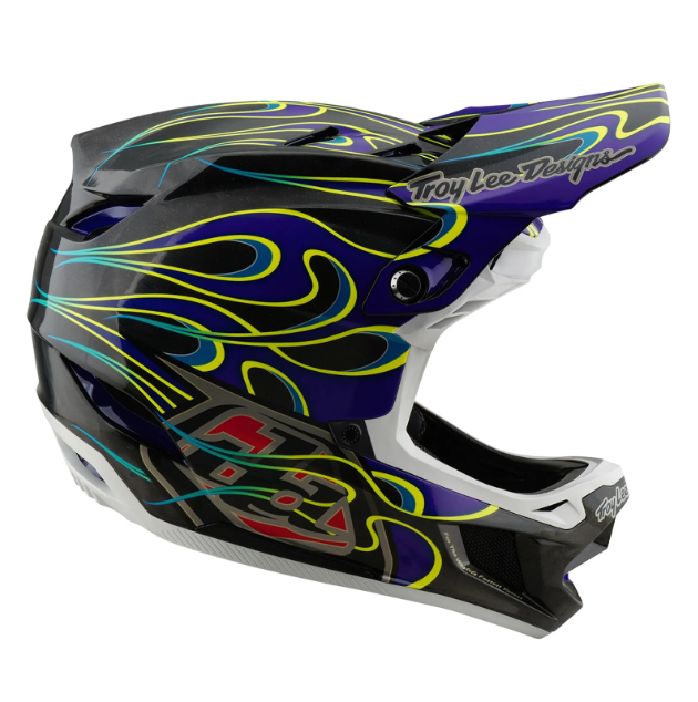 Colorful motocross helmet with flame design on a white background