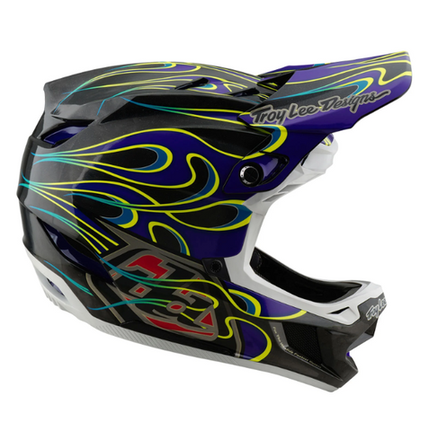 Colorful motocross helmet with flame design on a white background