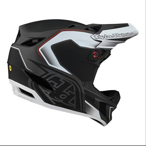 Black and white helmet with Troy Lee Designs branding on a white background