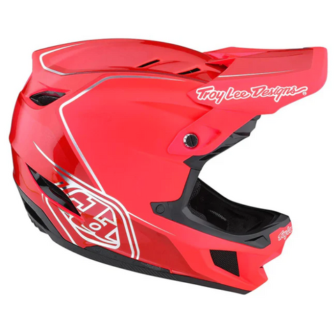 Red motocross helmet with Troy Lee Designs logo on a white background