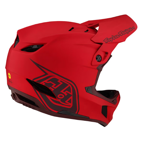 Red motorcycle helmet with visible branding on a white background