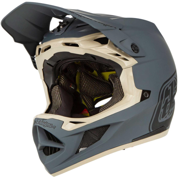 Gray and beige motocross helmet on a white background