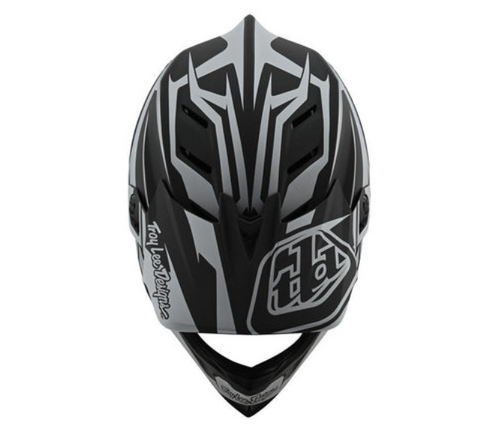 Black and gray motocross helmet with 'Troy Lee Designs' logo on a white background