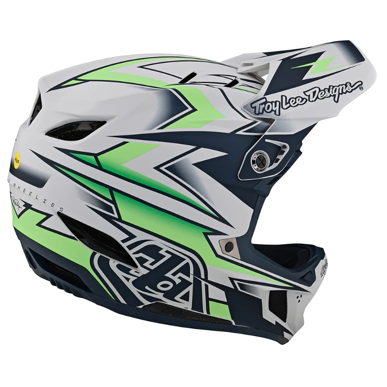 Motocross helmet with green and black design on a white background
