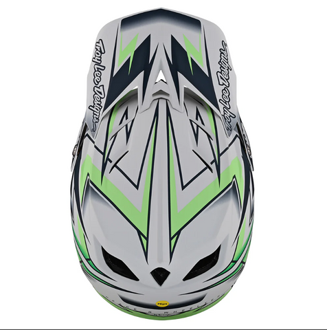 Motorcycle helmet with green and black design on a white background