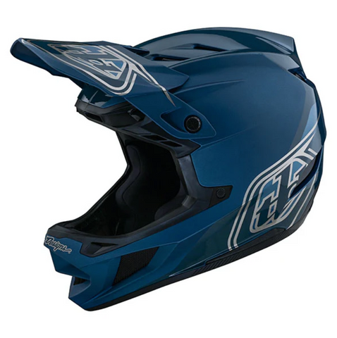 Blue motocross helmet with white branding on a white background