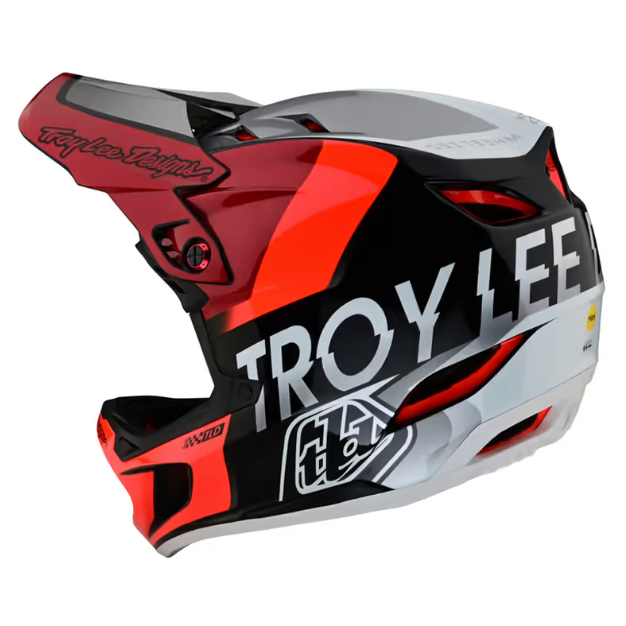 Troy Lee Designs helmet with red, black, and white design on a white background