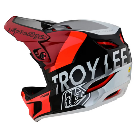 Troy Lee Designs helmet with red, black, and white design on a white background