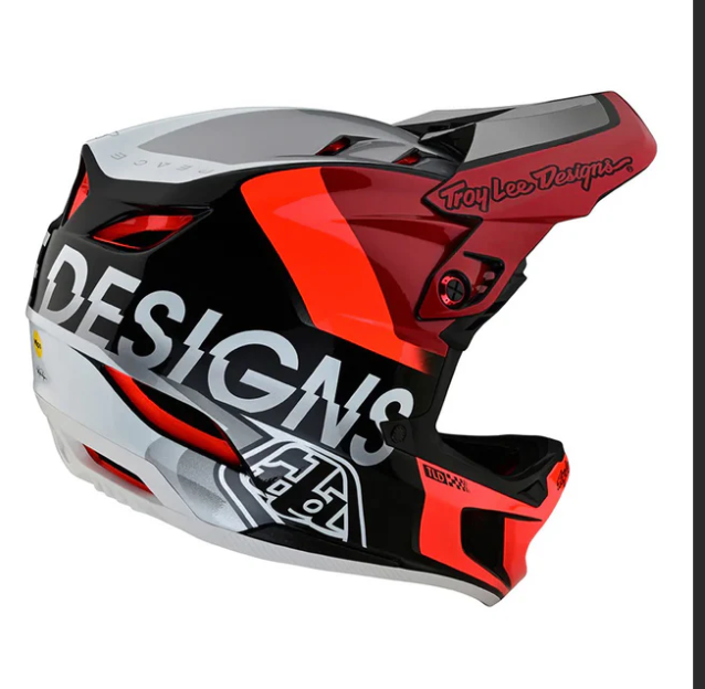 Black and red motorcycle helmet with 'Troy Lee Designs' branding on a white background