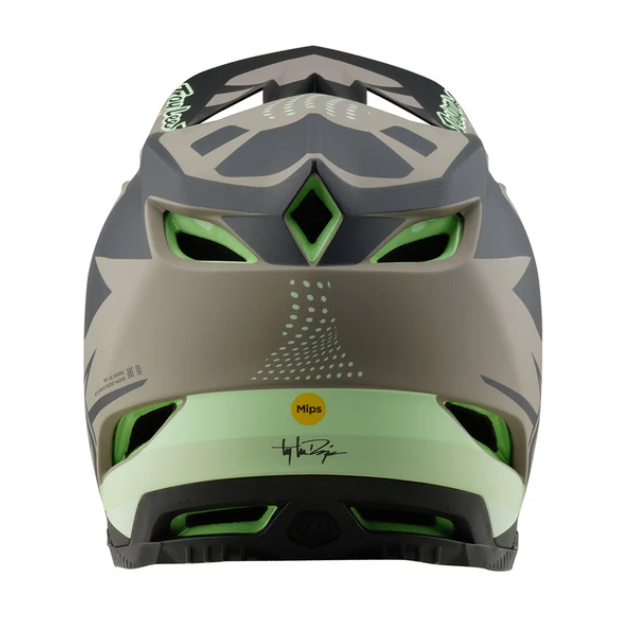 Gray and green helmet with MIPS technology on a white background